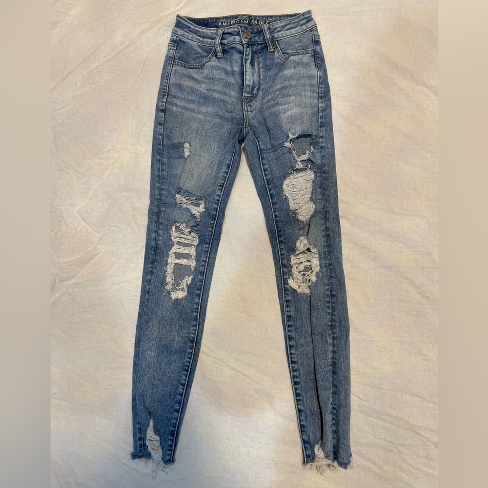 American eagle mid rise light wash ripped jeans